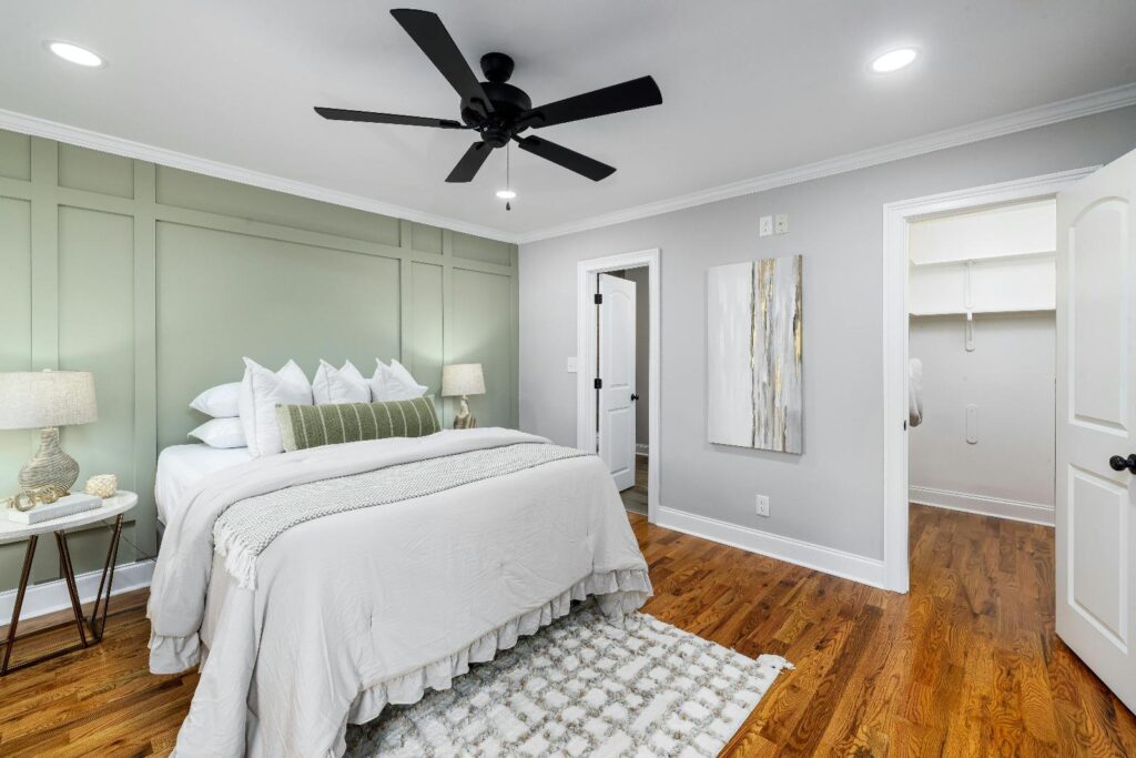 rustic bedroom with an ensuite and a rug. The best home cleaning services in Applewood