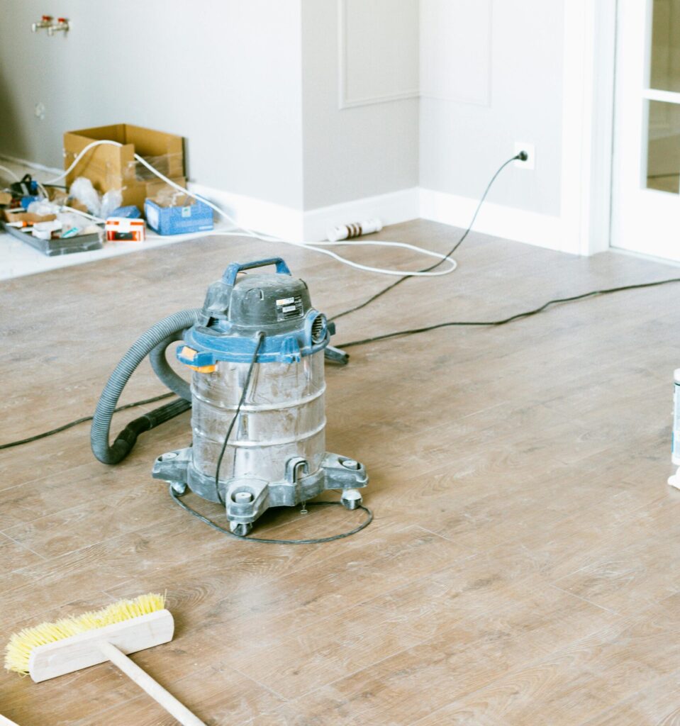 Industrial vacuum in a dust-covered room. The best post-construction cleaning in Denver
